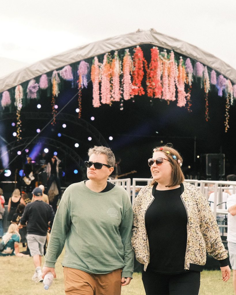 Festival goers walking in front of the stage